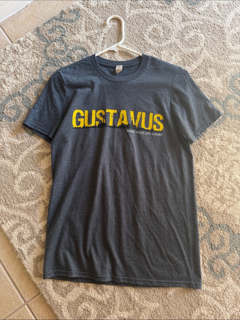 Anvil Gustavus Tee • Dark Gray Crewneck Tee with Yellow GUSTAVUS Logo